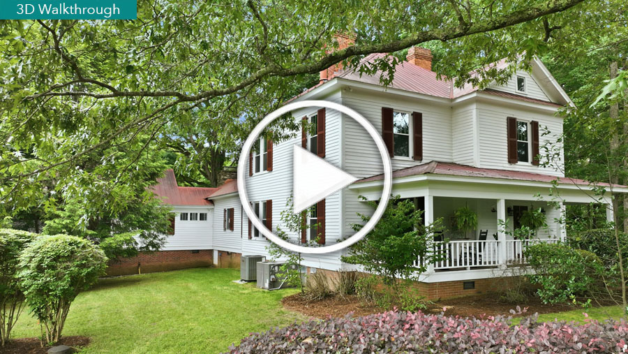 Photo of exterior of 2102 Bahama Rd with a "play" arrow graphic superimposed. Click the image to open the 3D Walkthrough Tour.
